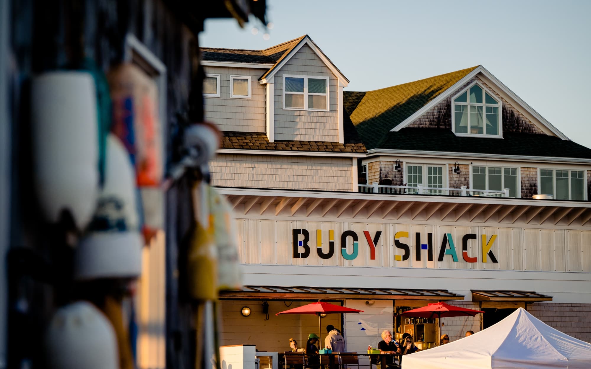 The Buoy Shack lobster shack and seafood restaurant with a heritage buoy shack to its left.