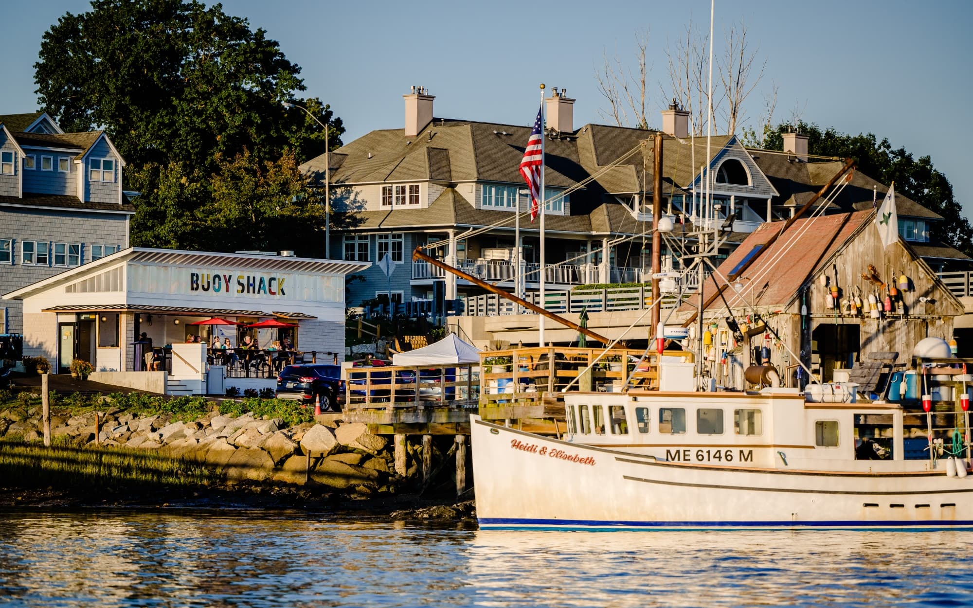 The Rolling Stone fishing boat docked in front of the Buoy Shack ocean restaurant and lobster shack.